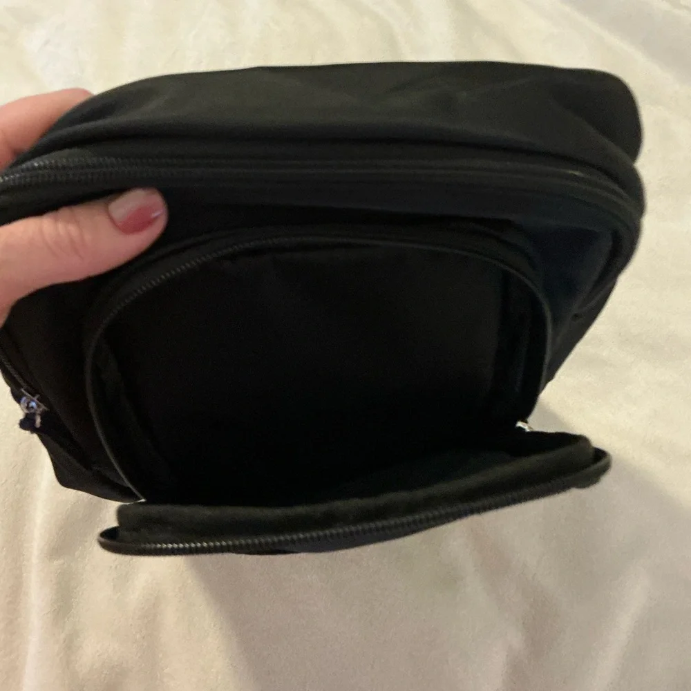 Sling backpack.New DSW